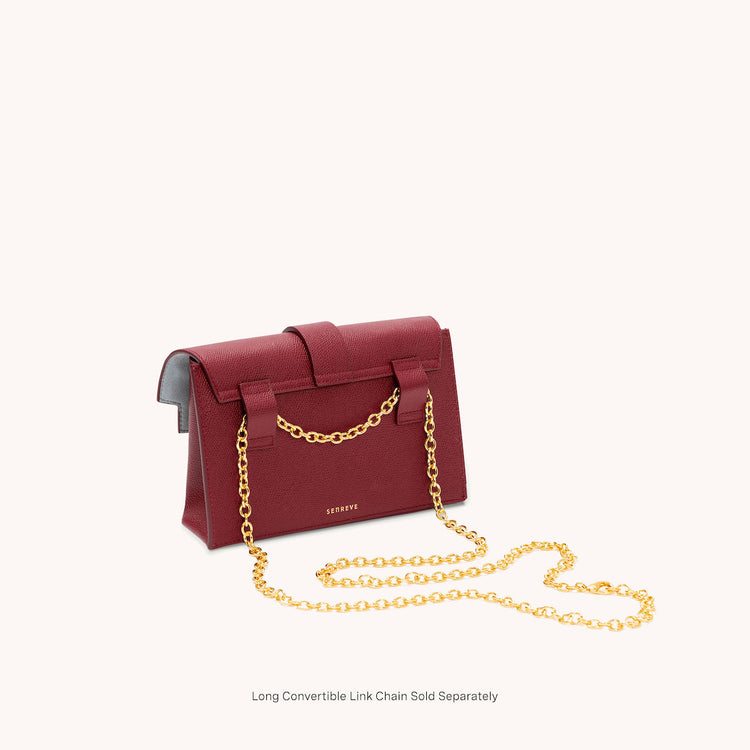 aria belt bag pebbled merlot back view with long gold chain