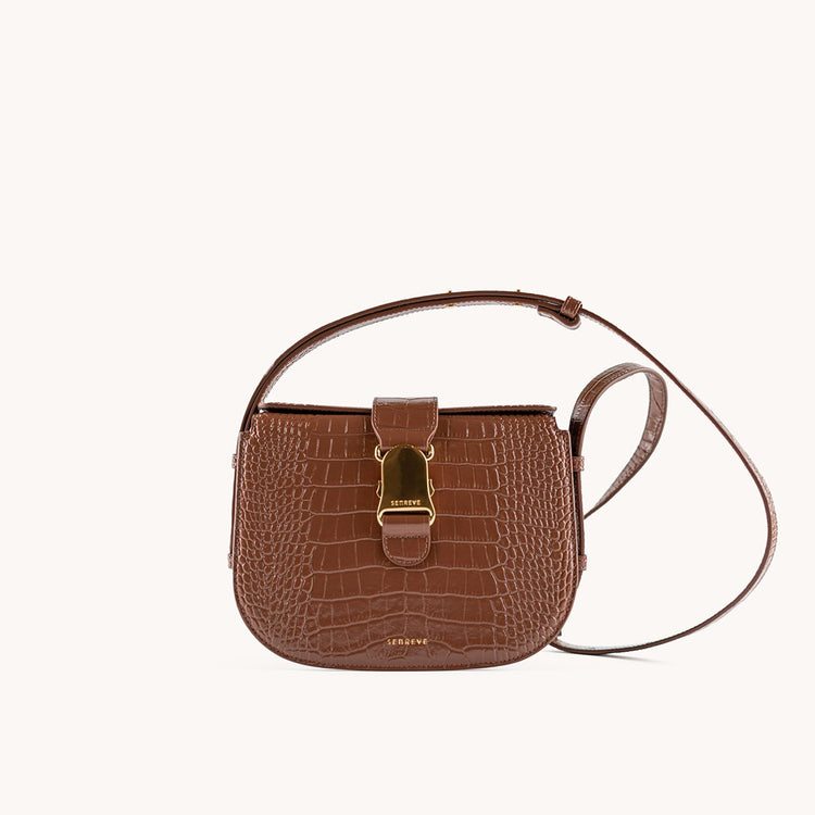 cadence crossbody vegan amica chestnut with gold hardware front view with strap
