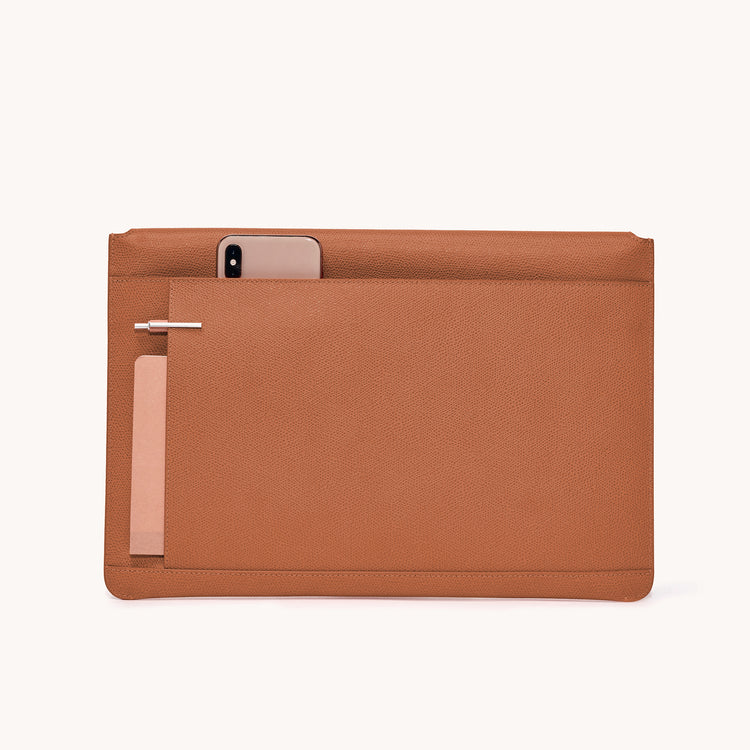 envelope laptop sleeve pebbled chestnut back view with items in exterior pockets