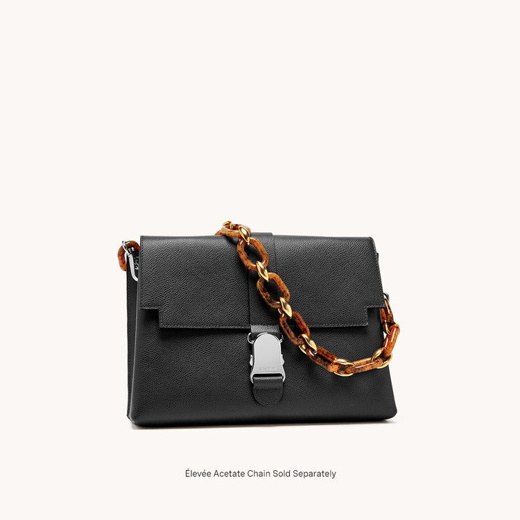 cadence shoulder bag pebbled noir front view with added acetate chain