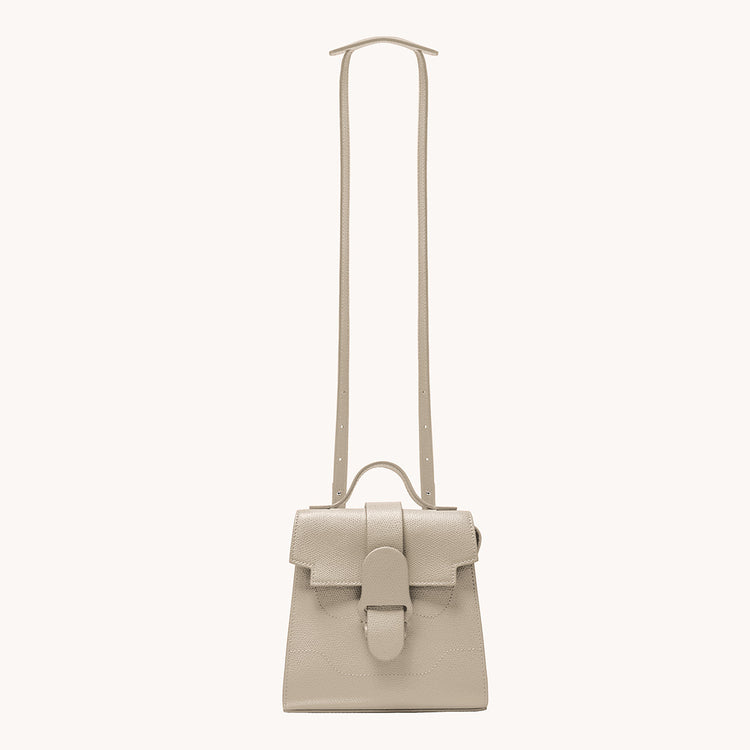 Mini Alunna Bag Pebbled Sand with Silver Hardware Front View with Long Strap
