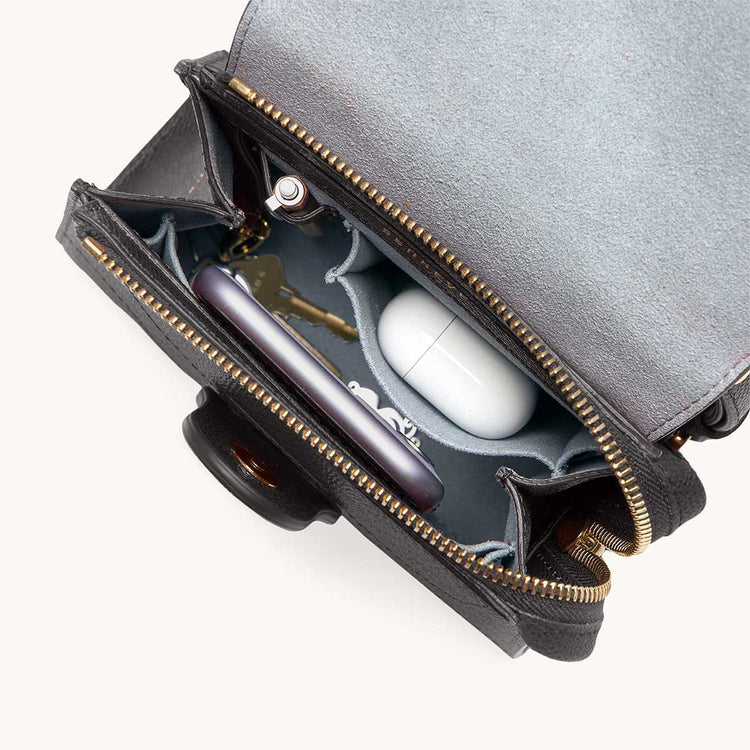 Mini Alunna Dolce Charcoal with Gold Hardware Interior View with What Fits: phone, AirPods, keys