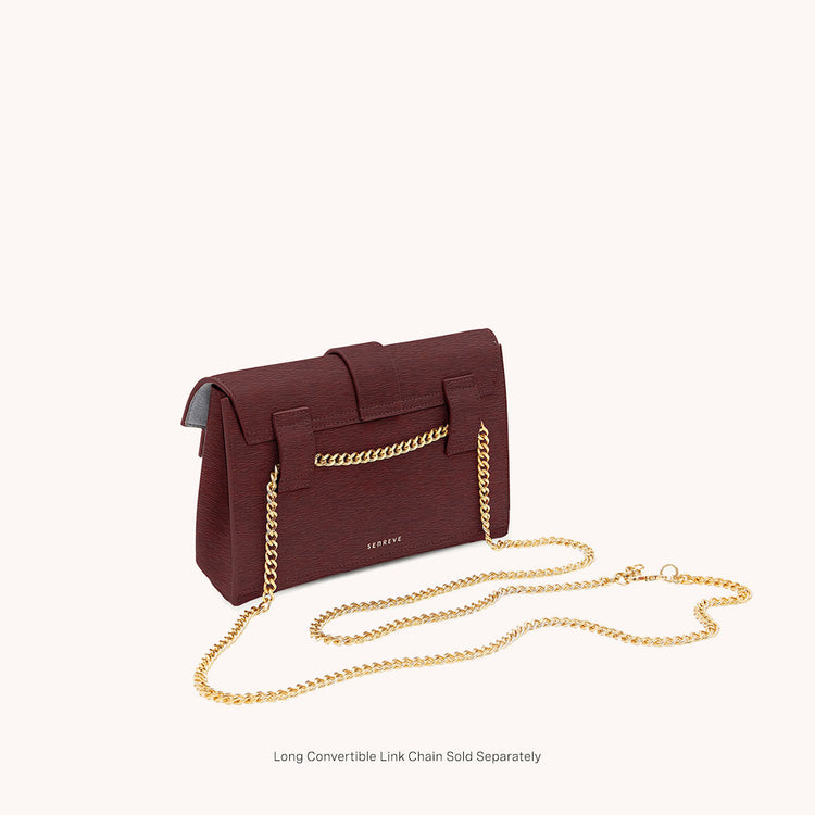 aria belt bag mimosa bordeaux back view with long gold chain