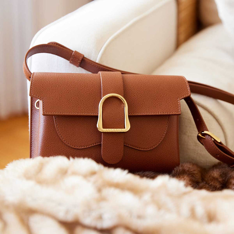 aria elevee belt bag pebbled walnut editorial photo