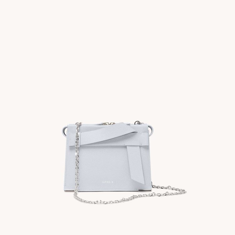 Mini Armonica Bag in pebbled ice with silver hardware. Front view - pictured with long convertible link chain in silver.