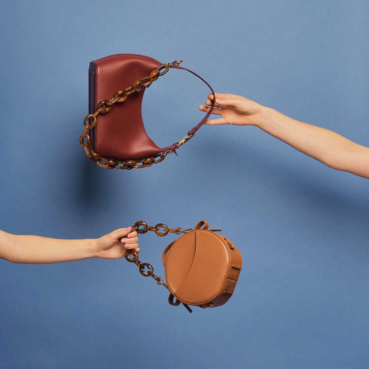 infinity acetate chain shoulder in tortoise on larger bag than the acetate chain bracelet
