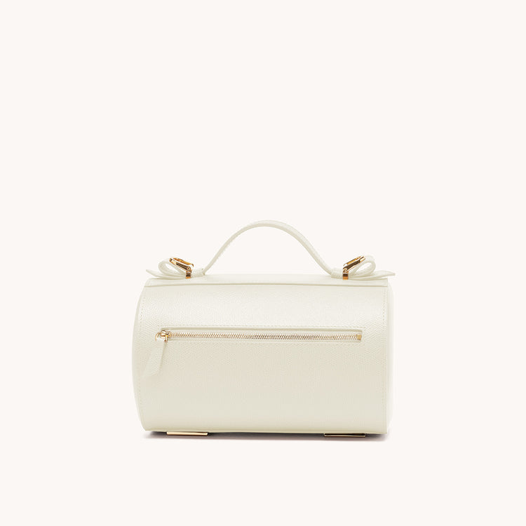 barrel bag pebbled cream back view with zipper