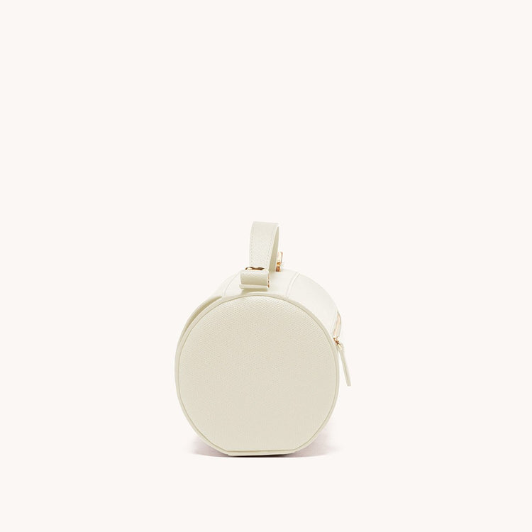 barrel bag pebbled cream side view