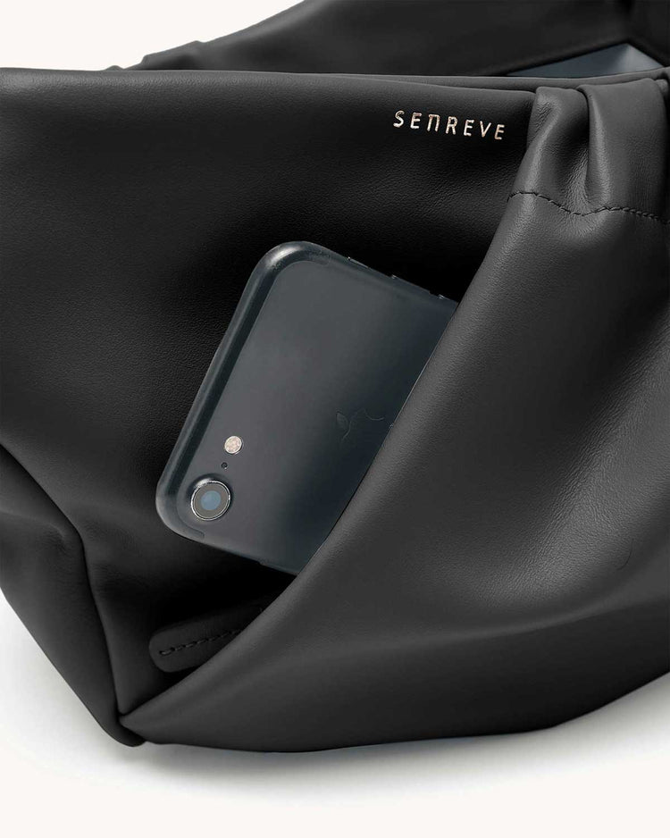 cornetti bag in cactus midnight close up exterior pocket with cell phone