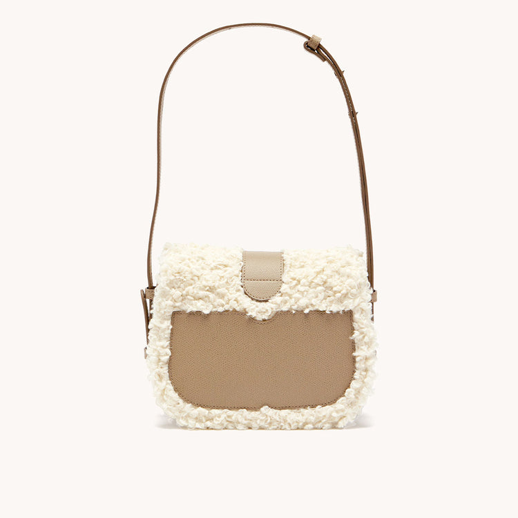 cadence crossbody faux shearling sand back view