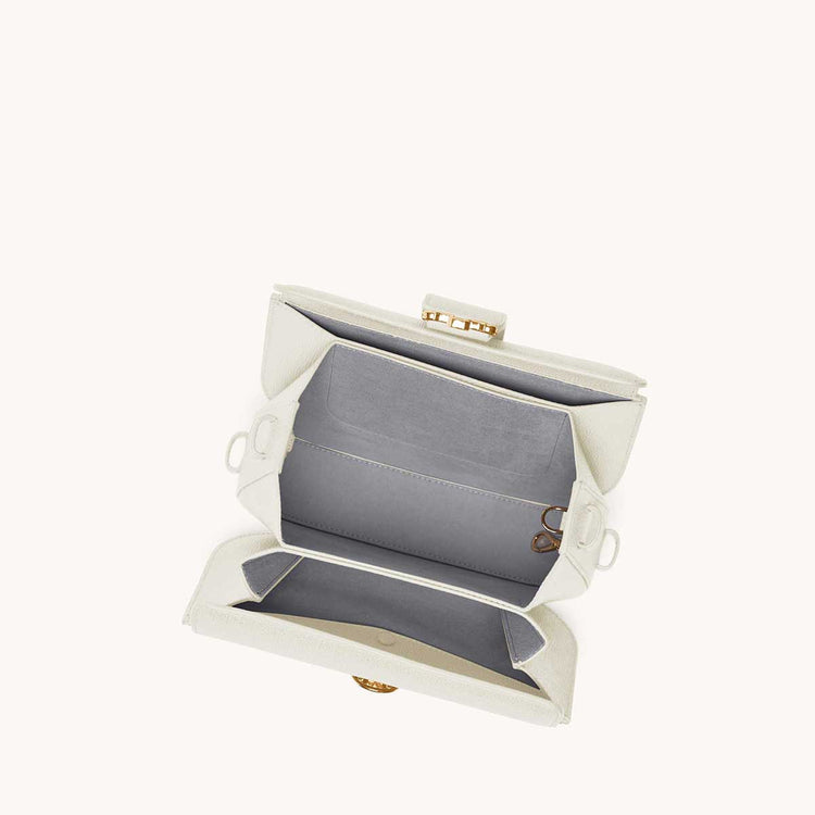 cadence crossbody pebbled cream interior view