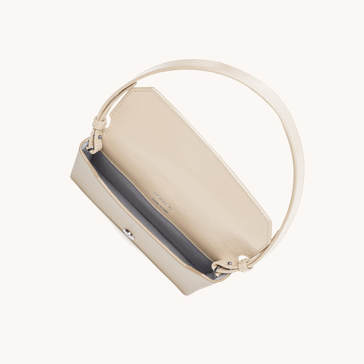 cavalla saddle bag in piatta ivory interior view