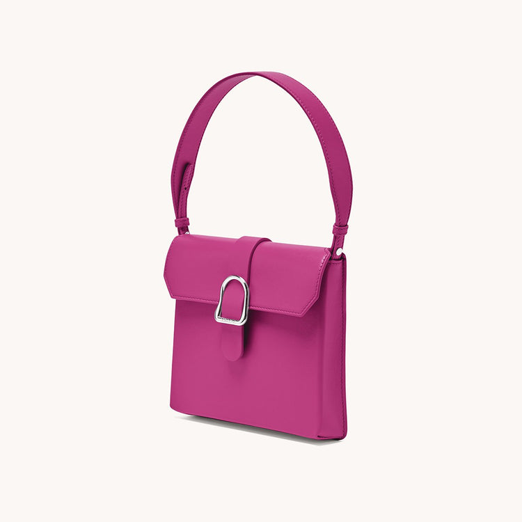 barbiecore pink leather handbag with buckle side view