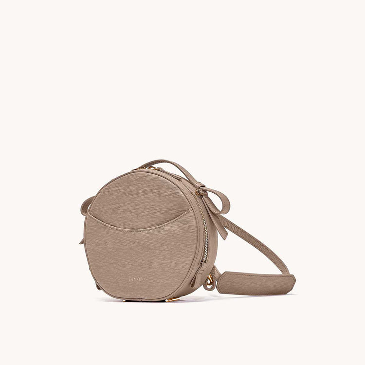 circa bag mimosa latte side view with leather strap