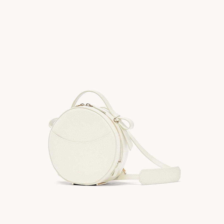 circa bag pebbled cream side view with leather strap