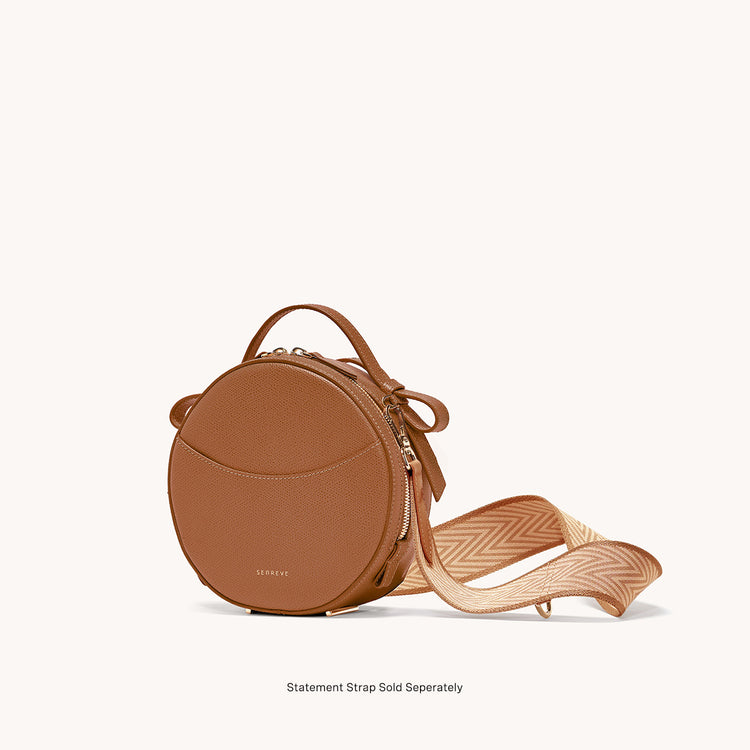 circa bag pebbled chestnut side view with statement strap