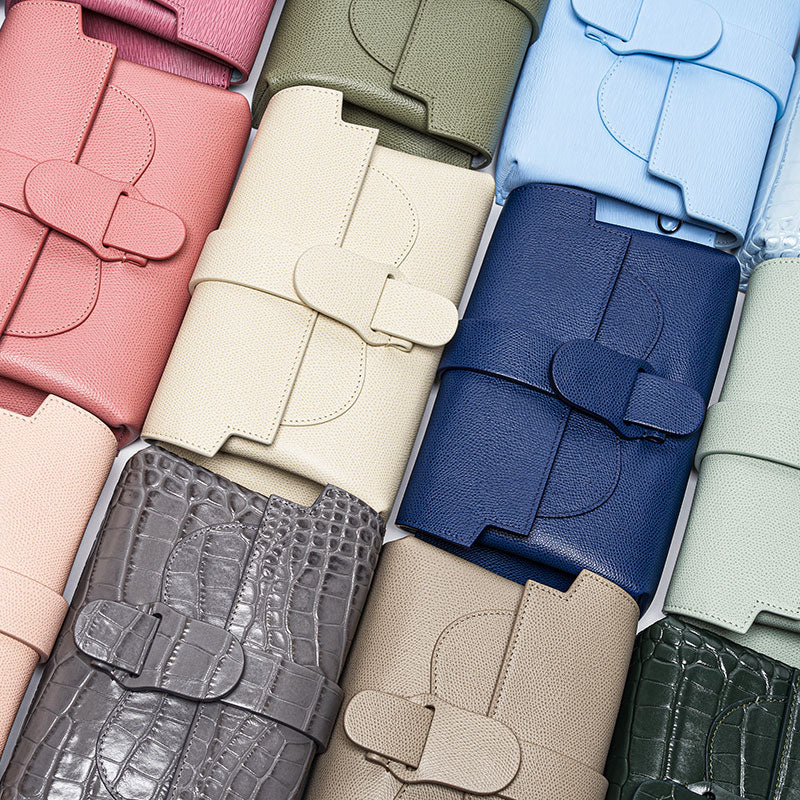 Colorful Aria bags laid flat next to each other