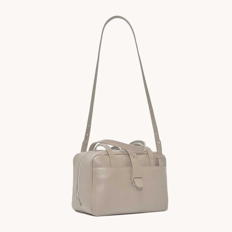 doctor bag pebbled sand side view with long strap