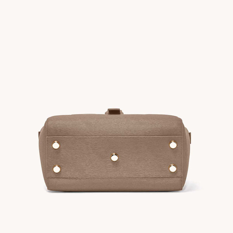Maestra Bag Mimosa Latte with Gold Hardware Base View With "Feet"