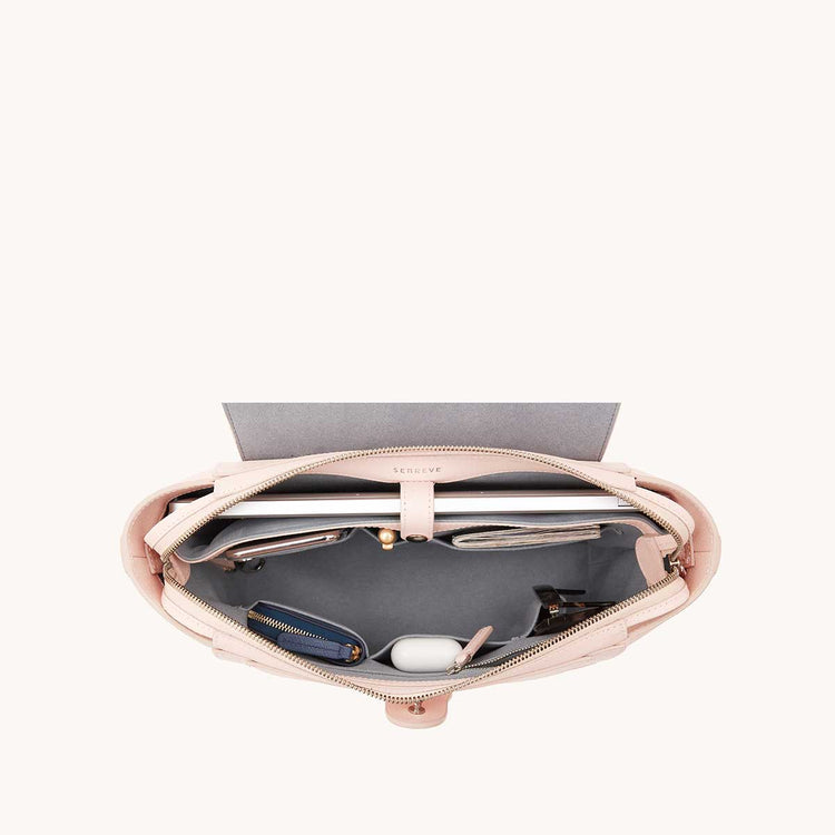 Midi Maestra Bag Pebbled Blush with Silver Hardware Interior View with What Fits: laptop, phone, cards, keys, AirPods, etc.
