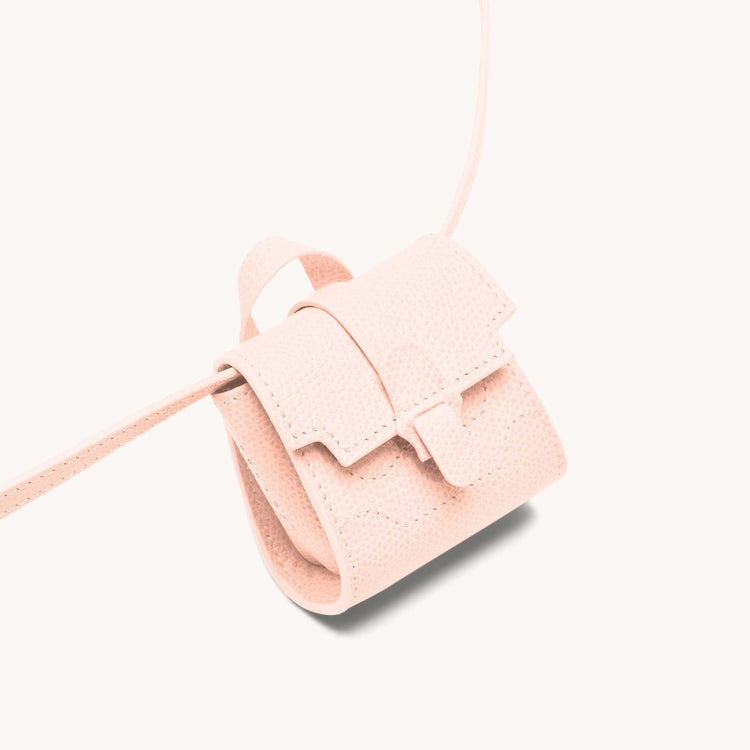 Milli maestra in blush closeup.