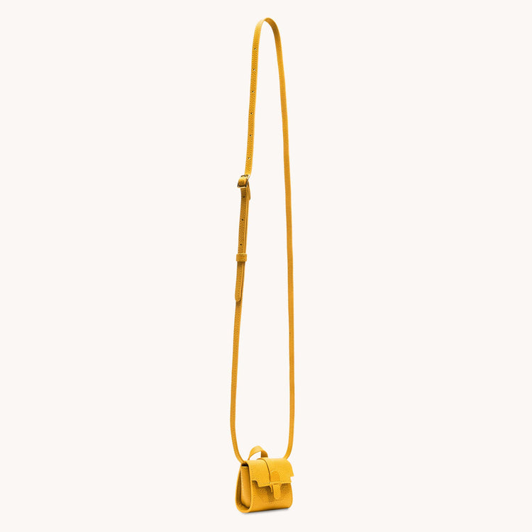 Milli maestra in dandelion view of shoulder strap.