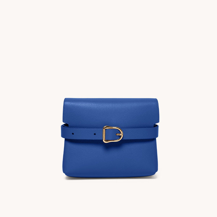 Mini cavalla satchel in azure front view with belt.