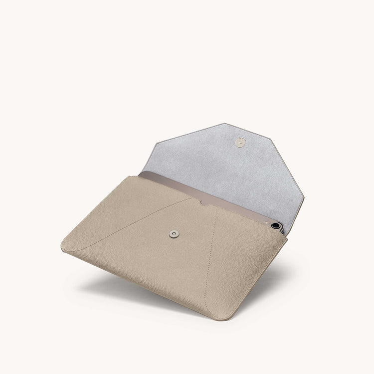 Mini envelope sleeve in sand angled view with flap open.