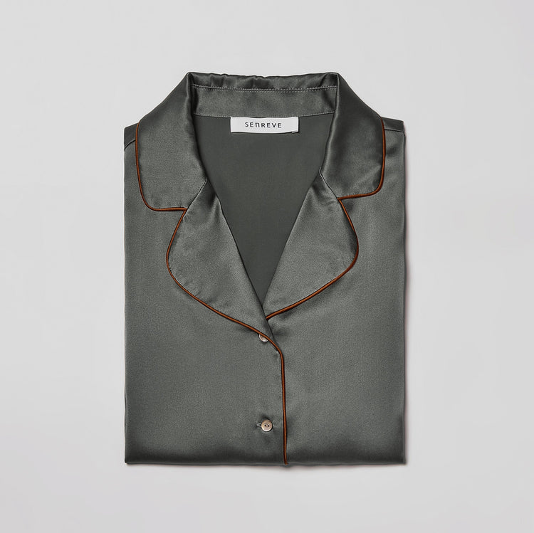 Lumi silk shirt in olive folded front view.