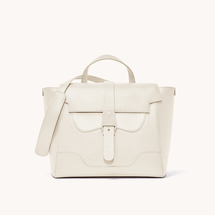 Maestra Bag Pebbled Cream with Silver Hardware Front View with long strap draped over top