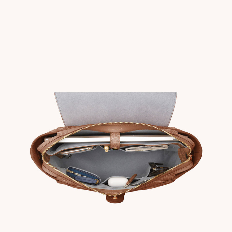 Midi Maestra Dragon Chestnut with Gold Hardware Interior View with What Fits: laptop, keys, cards, phone, AirPods, etc.